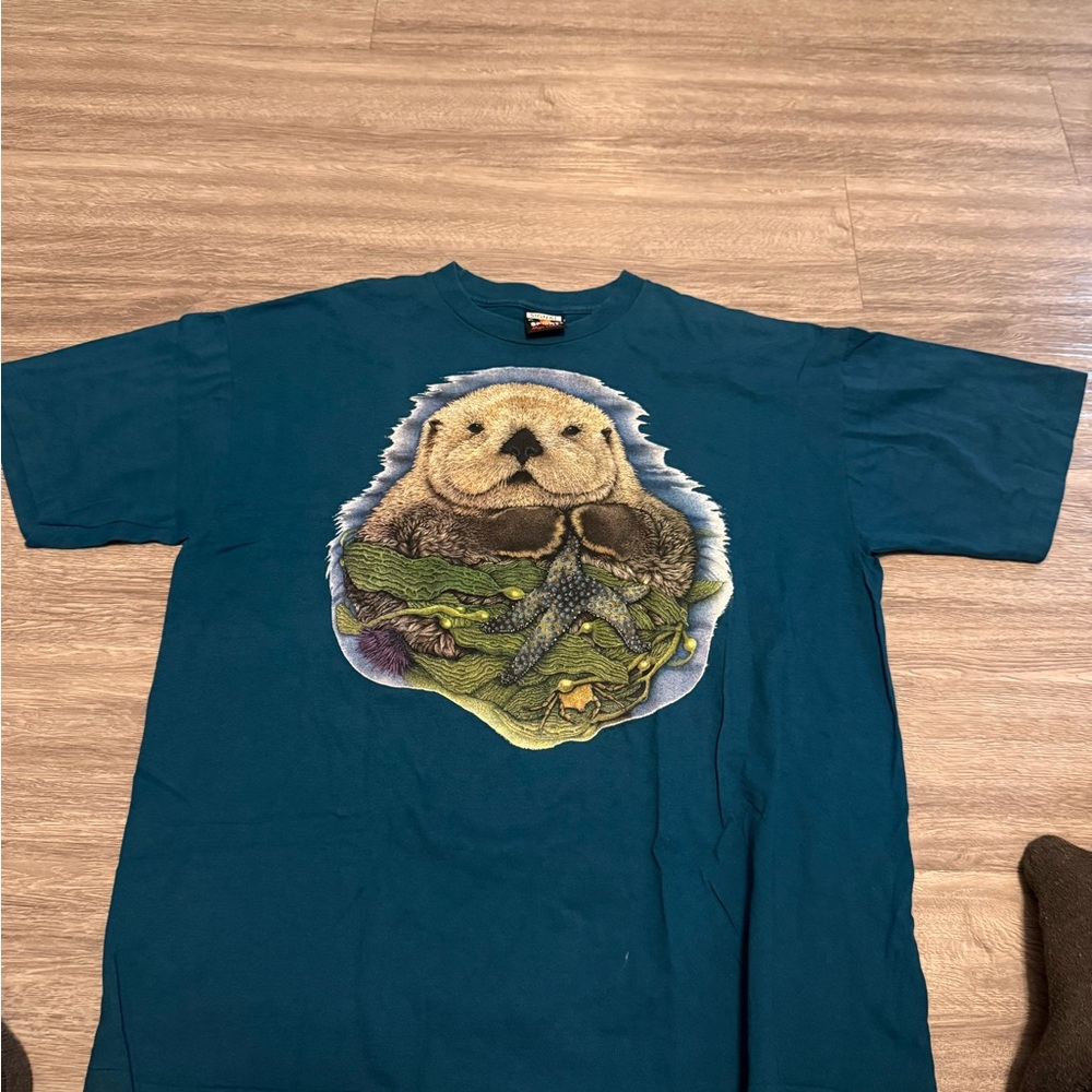 90's Signal Sport LAID BACK AT ASILOMAR OTTER SHIRT XL Big Face PEGGY MURRAY Art